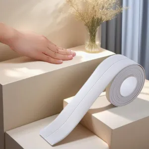 Detail shot of white waterproof sealing tape for kitchen and bathroom corner gap sealing.