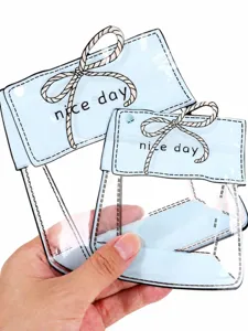 Detailed view of cute cartoon shaped bowknot transparent sealing bag for jewelry storage.