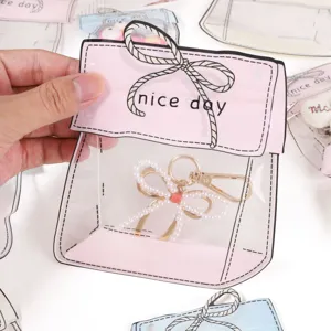 Cute cartoon shaped transparent sealing gift bag with bow and pearl keychain for jewelry storage