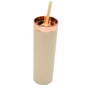 Detailed view of the 16oz matte straight tumbler with a rose gold lid and straw.