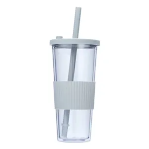Clear plastic tumbler with straw and silicone sleeve, ideal for cold drinks and boba tea.