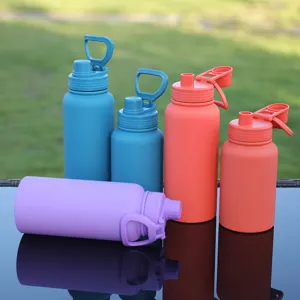 Stainless steel insulated sports water bottle with magnetic phone stand lid for outdoor use.