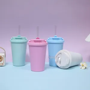 Detail view of colorful dual-drink straw cups showing lid and transparent straw design.