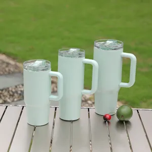 Stainless steel insulated car tumbler with handle and clear lid, outdoor portable cup.