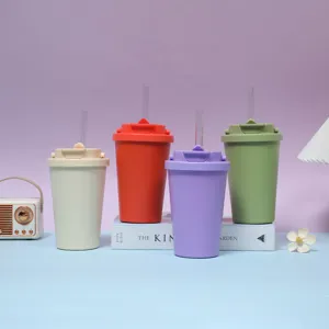 Detailed view of colorful double-drinking cups with clear straws in vibrant pastel shades.