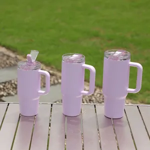 Stainless steel vacuum insulated travel tumbler with handle and straw lid in light purple color.