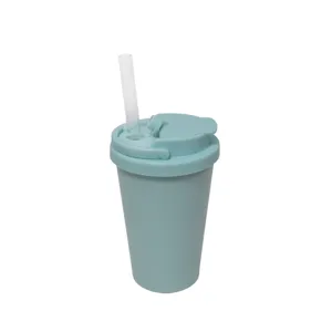Detailed view of light green dual-drink tumbler cup with transparent straw and functional lid.