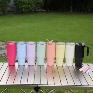 Stainless steel tumbler with straw and handle, large capacity vacuum insulated car cup for outdoor travel.
