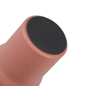 Close-up detail of the tumbler bottom showing the anti-slip black silicone protective boot.