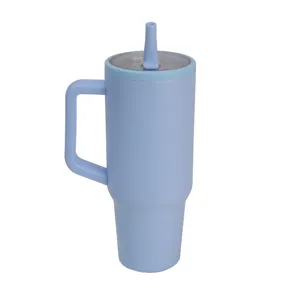Detailed view of light blue 40oz stainless steel insulated tumbler with handle and straw lid.