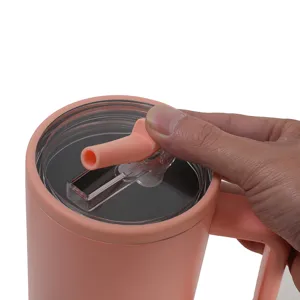 Detailed view of insulated tumbler lid with silicone straw and handle for daily use.