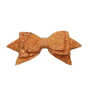Details of orange glitter bow straw accessory sparkling bowknot charm for cute drink tumblers.