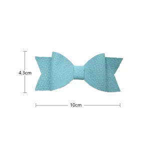 Blue leather bow hair clip, stylish mini hair accessory, sweet everyday styling piece for women.
