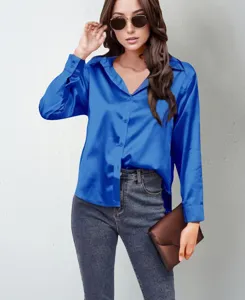 Close-up view of the royal blue satin long-sleeve button-down shirt detail and styling.