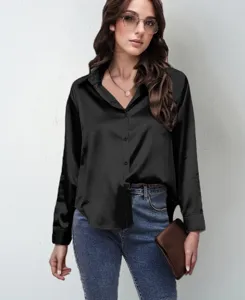 Close-up view of black satin long sleeve blouse displaying smooth glossy fabric and elegant collar.