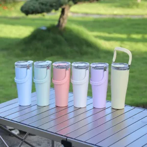 Large capacity stainless steel insulated tumbler with handle for outdoor travel and office use.