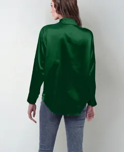 Back view detail of a dark green satin long sleeve shirt, showing smooth silk-like texture.