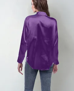 Back view detail of a vibrant purple satin long sleeve blouse showing smooth silky fabric texture.