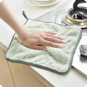 Thickened coral fleece kitchen cleaning cloth with hanging loop and checkered border.