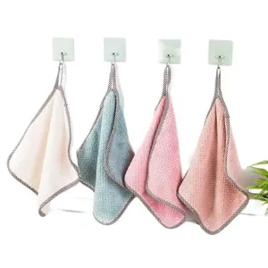 Hanging coral fleece hand towel set for kitchen and bathroom, soft and highly absorbent.