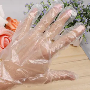 Gants jetables transparents pour le nettoyage domestique, la beauté et l'usage quotidien.