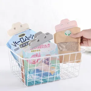 Large plastic food sealing clips for snack bags, airtight kitchen storage freshness clips.