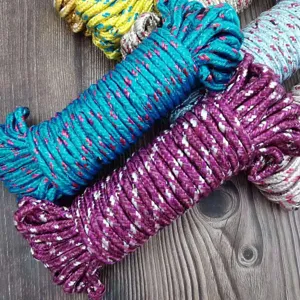 Close-up detail view of colorful braided nylon clotheslines, durable and anti-slip texture.
