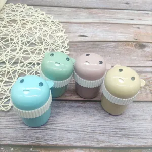 Cute cartoon bear toothpick holder detail view, portable plastic container for kitchen table.