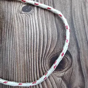 Nylon clothesline detail shot, white with red woven pattern, durable anti-slip rope for outdoor.