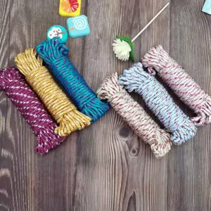 Detailed close-up view of durable multi-color braided nylon clotheslines in neat bundles.