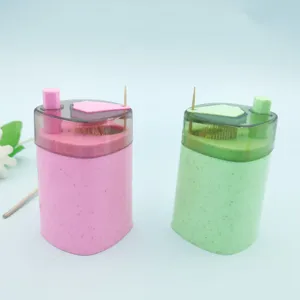 Automatic press-type plastic toothpick dispenser box holder container for home kitchen use.