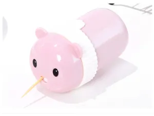 Detailed view of the cute pink bear toothpick holder, showing the convenient pop-up design.