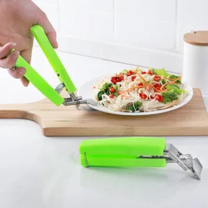 Stainless steel anti-scald bowl clip, kitchen tool for lifting hot plates easily and safely.
