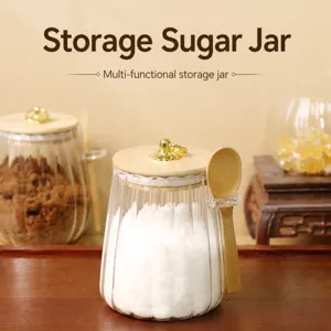 Clear glass storage jar with wooden lid and spoon, perfect for kitchen sugar and condiment storage.