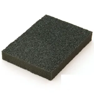 Close-up detail of abrasive carborundum sponge eraser for kitchen rust and dirt cleaning.