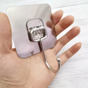 Stainless steel adhesive wall hook with transparent base, heavy duty door and wall hanger detail.