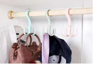 Crochet pivotant à quatre griffes à 360 degrés multifonction pour penderie à sacs.