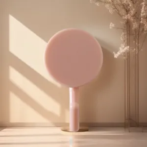 Pink rotatable wall hook, adhesive 3-prong design for modern kitchen and bathroom use.