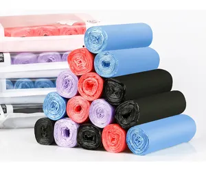 Detailed view of colorful disposable plastic garbage bag rolls in blue, red, purple and black.