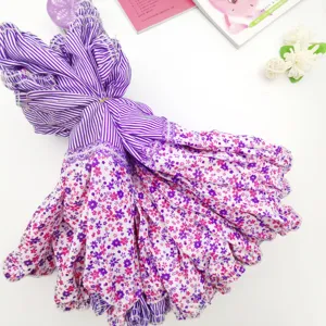 Detail shot of purple floral striped arm sleeves, long anti-fouling oversleeves for kitchen.