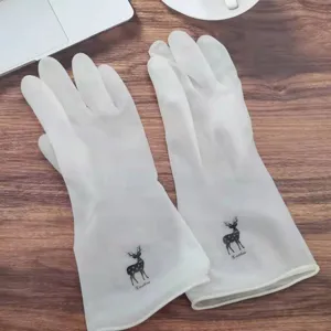 Detailed view of white waterproof household cleaning rubber gloves with cute deer print.
