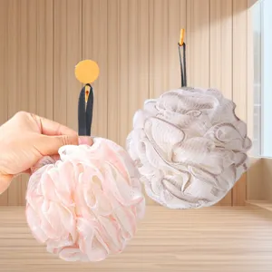 Large mesh shower pouf sponge for body scrubbing, soft exfoliating bath sponge with hanging rope.