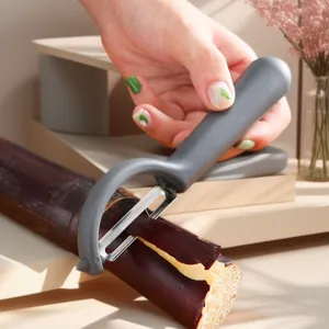Pelador de frutas y verduras de acero inoxidable en forma de P, herramienta de cocina ergonómica.