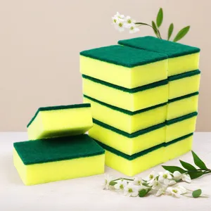 Double-sided kitchen cleaning sponge and scouring pad for daily dishwashing and pot scrubbing.