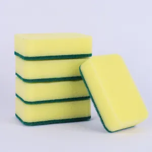 Kitchen double-sided dishwashing sponge, yellow absorbent foam and green scrubbing pad.