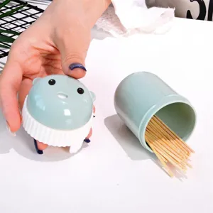 Plastic cartoon toothpick box, cute bear press-type holder, creative home table storage.