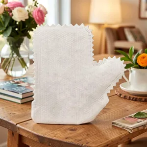 Wegwerp non-woven schoonmaakhandschoenen, handige poetsdoek in handschoenvorm voor huishouden.