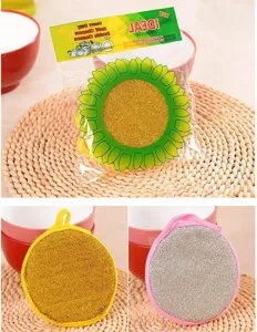 Round double-sided dishwashing sponge with metallic scrubber for kitchen pot and pan cleaning.