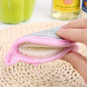Round double-sided dishwashing sponge with silver scouring pad and pink trim for kitchen cleaning.