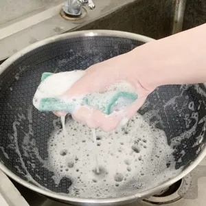 Spugna per pulizia bifacciale al carborundum per cucina e lavaggio stoviglie efficiente.
